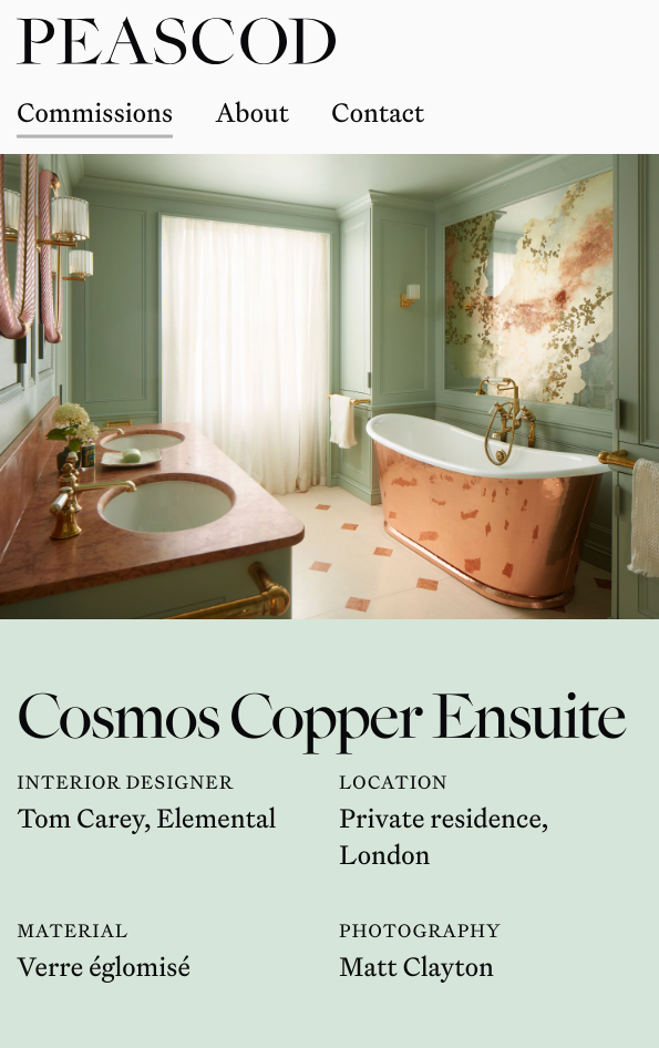 Screenshot of project on website with copper bath and gold mirror.