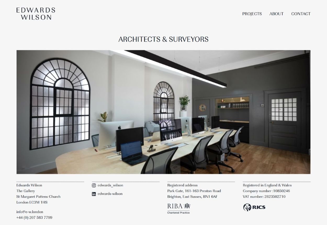 Website screenshot with an image of a modern office.