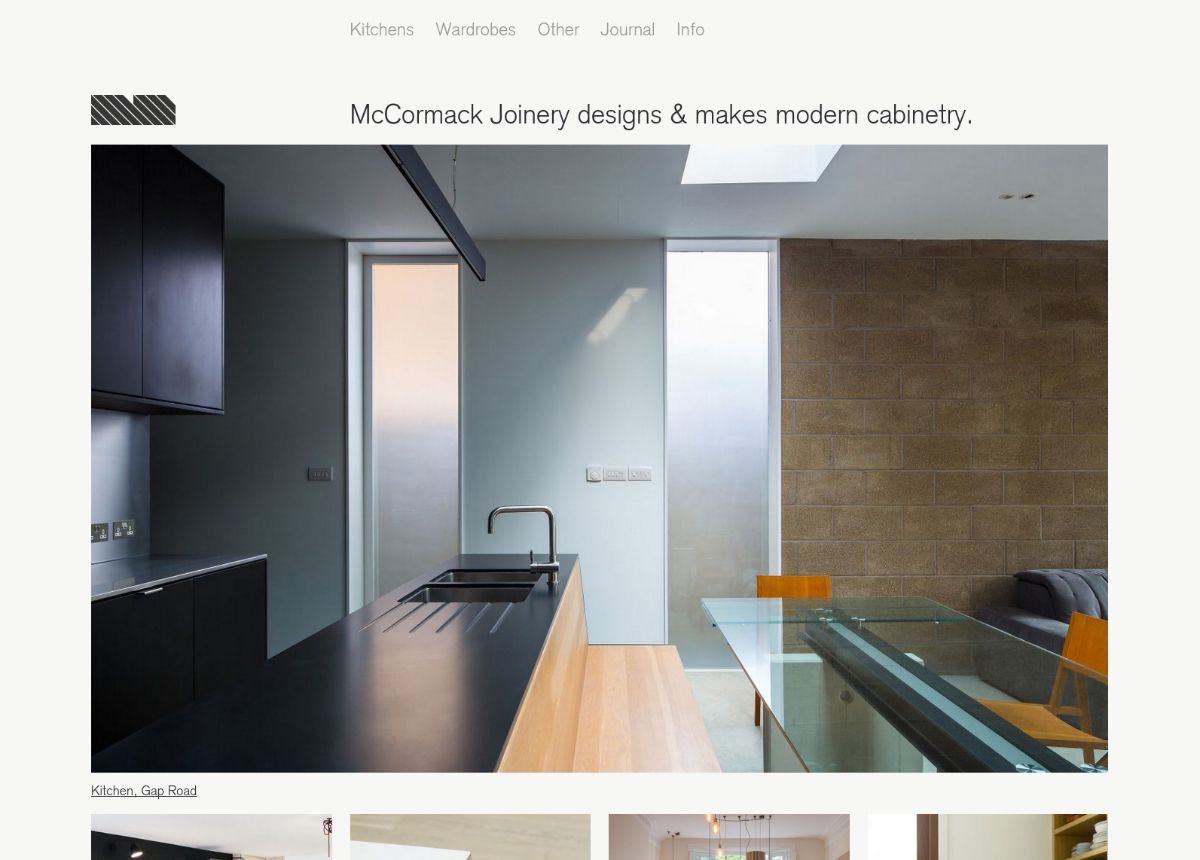 Website homepage of cabinet makers McCormack Joinery showing a modern kitchen.